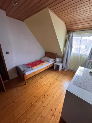 Ein Bett oder Betten in einem Zimmer der Unterkunft Austria Traveller Hotel Kirchdorf