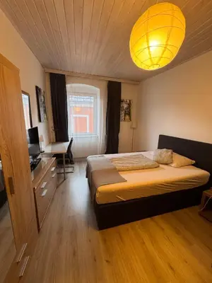 Ein Bett oder Betten in einem Zimmer der Unterkunft Austria Traveller Hotel Kirchdorf