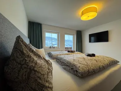 Ein Bett oder Betten in einem Zimmer der Unterkunft Appartement Radstadtblick