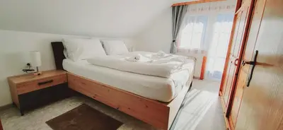 Ein Bett oder Betten in einem Zimmer der Unterkunft Fischbacher App 3 by Alpenidyll Apartments