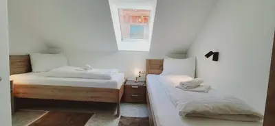 Ein Bett oder Betten in einem Zimmer der Unterkunft Fischbacher App 3 by Alpenidyll Apartments