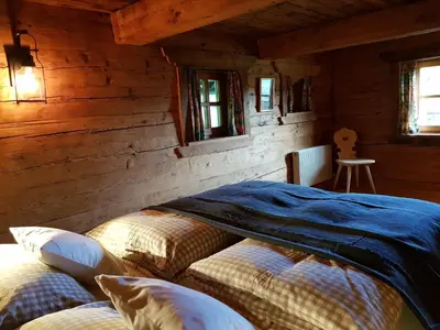 Ein Bett oder Betten in einem Zimmer der Unterkunft Ferienbauernhaus Stergut