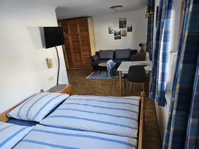 Ein Bett oder Betten in einem Zimmer der Unterkunft Ferienwohnung Mitterdiel