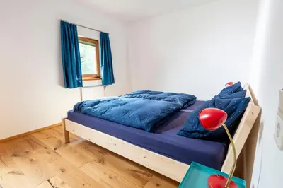 Ein Bett oder Betten in einem Zimmer der Unterkunft Apartments Sopherl - by myNests