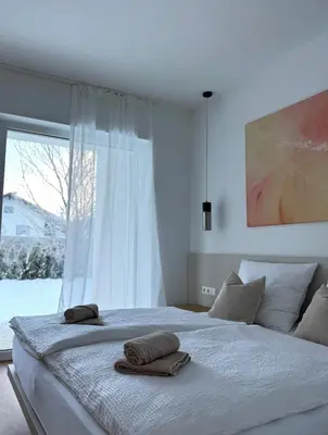 Ein Bett oder Betten in einem Zimmer der Unterkunft Stylisches Design-Apartment