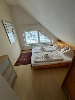 Ein Bett oder Betten in einem Zimmer der Unterkunft Fewo-Obertauern Maisonette