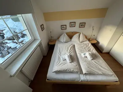 Ein Bett oder Betten in einem Zimmer der Unterkunft Fewo-Obertauern Maisonette