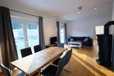 Ein Sitzbereich in der Unterkunft Alpenherz Appartment