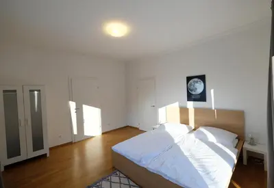 Ein Bett oder Betten in einem Zimmer der Unterkunft Alpenherz Appartment