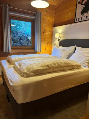 Ein Bett oder Betten in einem Zimmer der Unterkunft Luxury Filzmoos Chalet