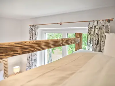 Ein Bett oder Betten in einem Zimmer der Unterkunft Getaway Appartement 8 Hauser Kaibling by AA Holiday Homes