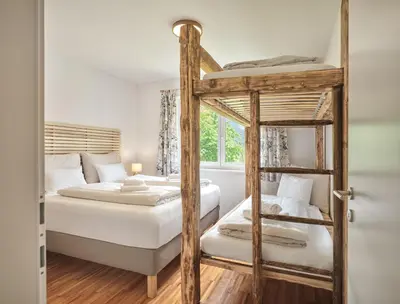 Ein Bett oder Betten in einem Zimmer der Unterkunft Getaway Appartement 8 Hauser Kaibling by AA Holiday Homes