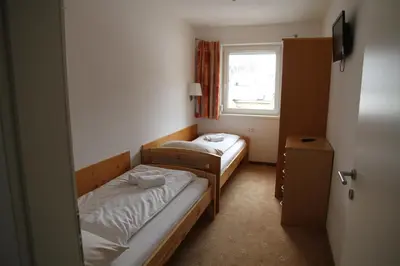 Ein Bett oder Betten in einem Zimmer der Unterkunft Obertauern Fewo Freya Top 4 by Kamper