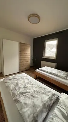 Ein Bett oder Betten in einem Zimmer der Unterkunft Ferienwohnung Casa Amedea