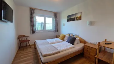 Ein Bett oder Betten in einem Zimmer der Unterkunft Haus Tauernseitn
