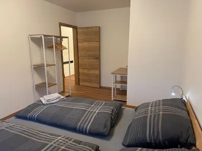 Ein Bett oder Betten in einem Zimmer der Unterkunft Ski und Wander Ferienwohnung Galsterberg-Blick Pruggern - Schladming-Dachstein