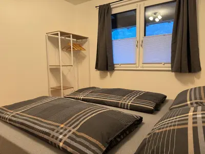 Ein Bett oder Betten in einem Zimmer der Unterkunft Ski und Wander Ferienwohnung Galsterberg-Blick Pruggern - Schladming-Dachstein