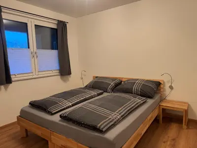 Ein Bett oder Betten in einem Zimmer der Unterkunft Ski und Wander Ferienwohnung Galsterberg-Blick Pruggern - Schladming-Dachstein