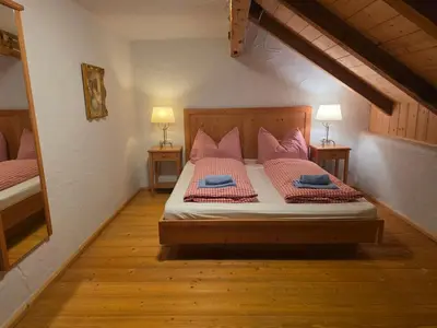 Ein Bett oder Betten in einem Zimmer der Unterkunft SCHENE Kammer