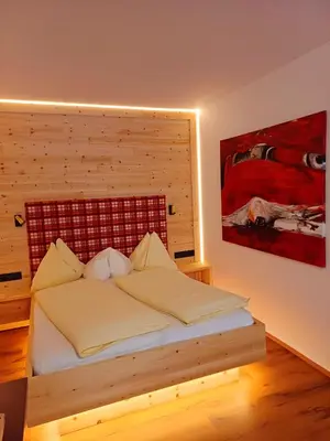 Ein Bett oder Betten in einem Zimmer der Unterkunft Biobauernhof Appartement Oberreith
