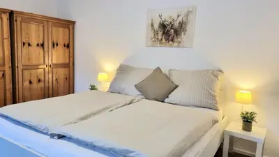 Ein Bett oder Betten in einem Zimmer der Unterkunft apartment77
