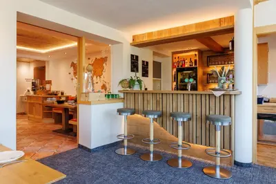 Ein Restaurant oder anderes Speiselokal in der Unterkunft Hotel Das Hochkönig
