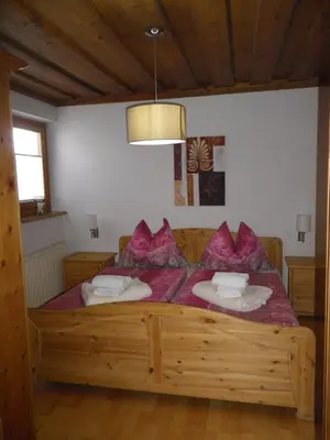 Ein Bett oder Betten in einem Zimmer der Unterkunft Landhaus Weiss