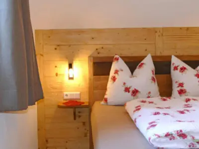 Ein Bett oder Betten in einem Zimmer der Unterkunft Holiday home in Salzburg with sauna