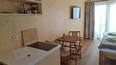 Ein Sitzbereich in der Unterkunft Tiny House