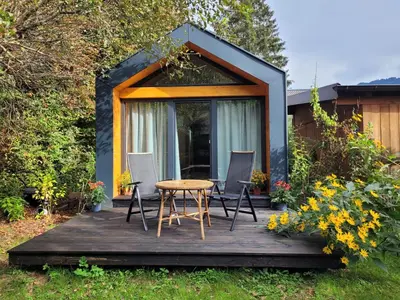 Ein Garten an der Unterkunft Tiny House