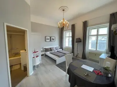 Ein Bett oder Betten in einem Zimmer der Unterkunft SEEPERLE am See