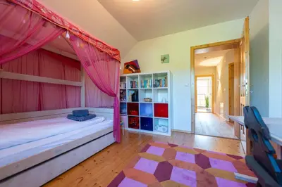 Ein Bett oder Betten in einem Zimmer der Unterkunft Villa Bellevue Altaussee