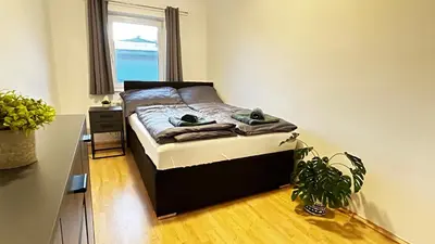 Ein Bett oder Betten in einem Zimmer der Unterkunft Almtal Apartments
