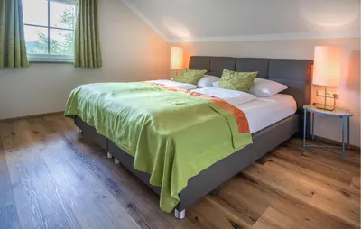 Ein Bett oder Betten in einem Zimmer der Unterkunft Nice Home In Mariapfarr With Sauna