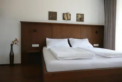 Ein Bett oder Betten in einem Zimmer der Unterkunft Apartment Grimmingpanorama