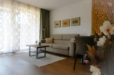 Ein Sitzbereich in der Unterkunft Apartment Grimmingpanorama