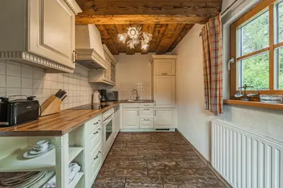 Küche/Küchenzeile in der Unterkunft Dachstein Chalet Goisern