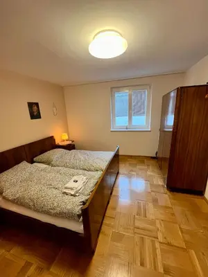 Ein Bett oder Betten in einem Zimmer der Unterkunft Ferienwohnung Museum Huemer