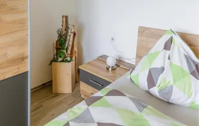 Ein Bett oder Betten in einem Zimmer der Unterkunft Gemuetliches Ferienhaus