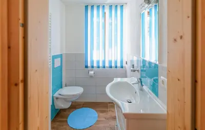 Ein Badezimmer in der Unterkunft Gemuetliches Ferienhaus