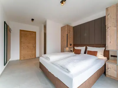 Ein Bett oder Betten in einem Zimmer der Unterkunft Grebenzen Lodges 49B