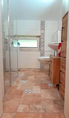 Ein Badezimmer in der Unterkunft Ferienwohnungen Wolfenhaus am See