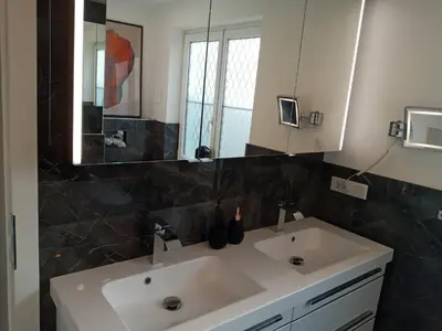 Ein Badezimmer in der Unterkunft Schafberg Luxury Apartment