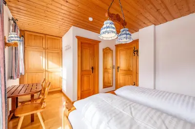 Ein Bett oder Betten in einem Zimmer der Unterkunft Alpenvilla Janerweg - by myNests