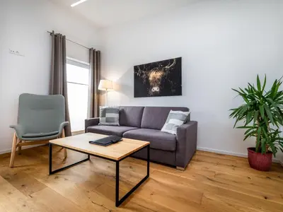 Ein Sitzbereich in der Unterkunft Apartment Bergblick Deluxe by Interhome