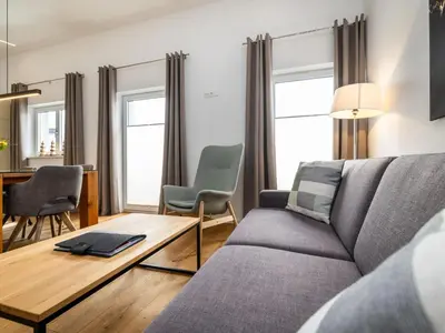 Ein Sitzbereich in der Unterkunft Apartment Bergblick Deluxe by Interhome