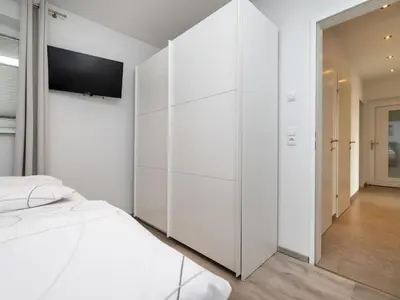 Ein Bett oder Betten in einem Zimmer der Unterkunft Apartment Bergblick by Interhome