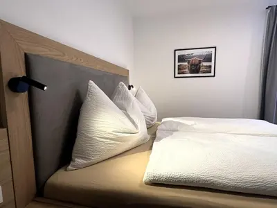 Ein Bett oder Betten in einem Zimmer der Unterkunft The HIDDEN Apartment
