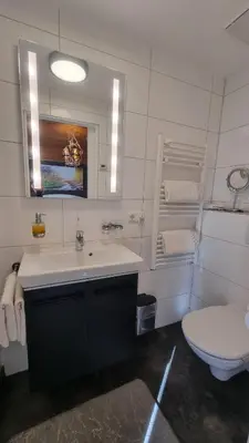 Ein Badezimmer in der Unterkunft Landhaus Osborne near Hallstatt