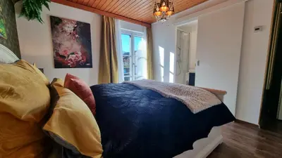 Ein Bett oder Betten in einem Zimmer der Unterkunft Landhaus Osborne near Hallstatt